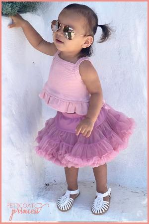 Girl wearing dusty mauve petticoat tutu