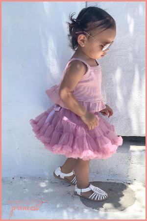 Girl wearing fluffy soft ruffle dusty mauve petticoat tutu