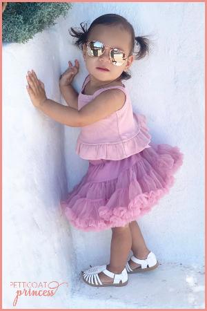 Girl wearing fluffy soft ruffle dusty mauve petticoat tutu
