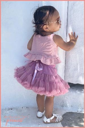 Girl wearing dusty mauve petticoat tutu