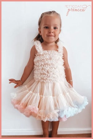 champagne coloured tutu dress wth soft pastel ruffles