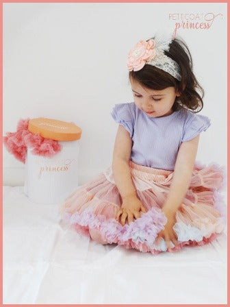 Soft dusty pink pastel rainbow ruffles