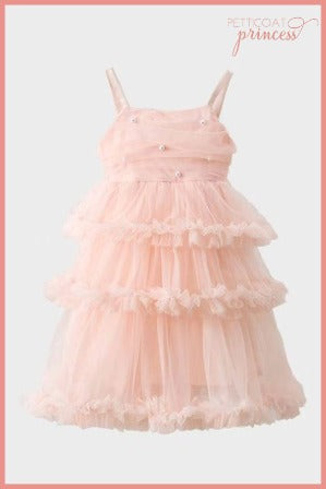 pink tiered tulle dress with pearls