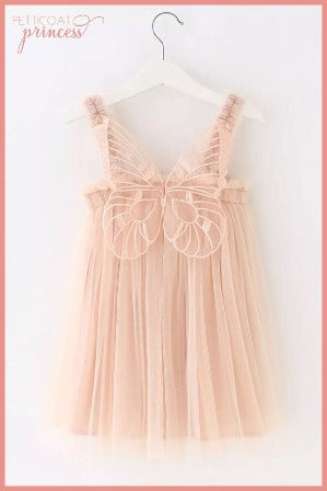 soft peach coloured tulle dress with butterfly wings