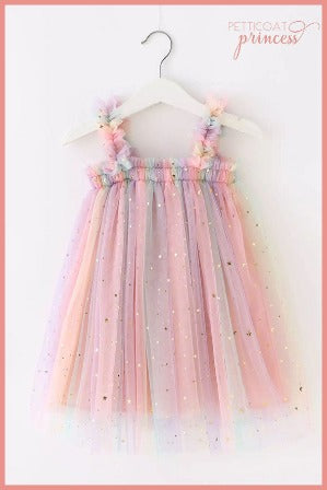 pink and rainbow tulle dress with gold stars and moons